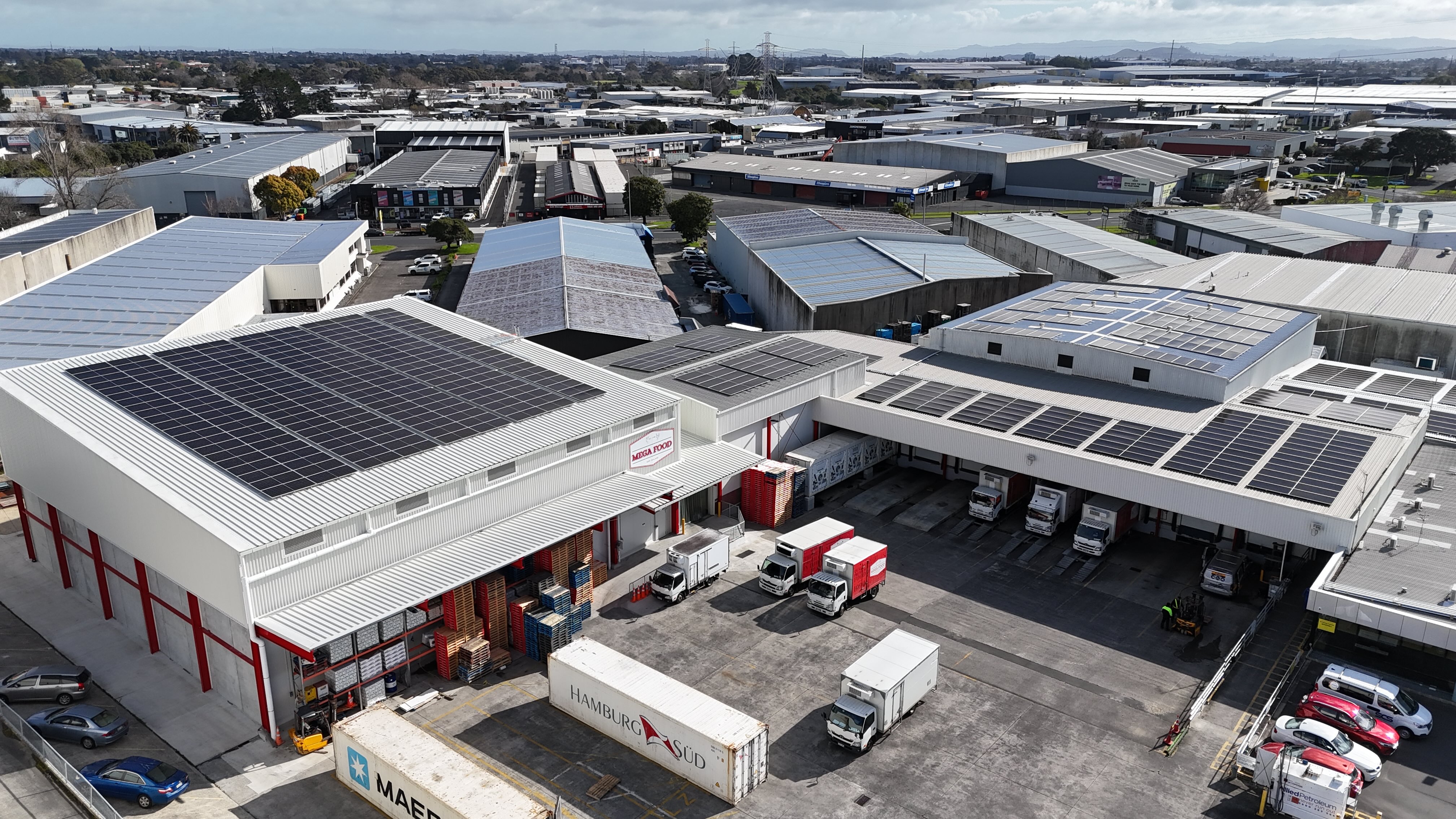Commercial solar panel installation on a New Zealand warehouse rooftop